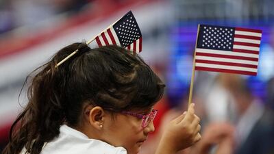 People wait before Donald Trump speaks at a campaign kick off rally at the Amway Center in Orlando, Florida. Reuters