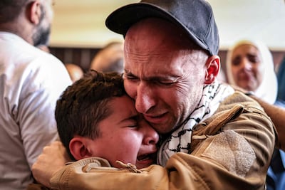 A Palestinian detainee arrives in Ramallah after being released by Israel last year. AFP