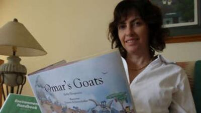 Kathy Hoopmann with her new book, Omar's Goats.