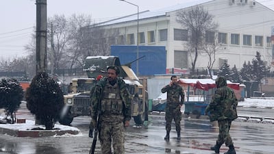 National army soldiers arrive at the site of explosion near the military academy in Kabul, Afghanistan. AP