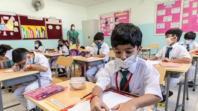 Children get organised on the first day of school.