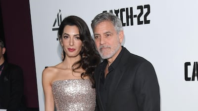 George and Amal Clooney, in a strapless Ralph & Russo dress, attend the 'Catch 22' premiere on May 15, 2019 in London. Getty Images