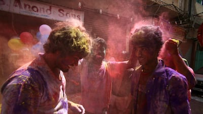 Indians enjoy Holi festival celebrations in Jammu. Channi Anand / AP Photo