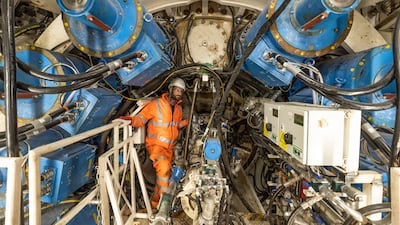 Workers help bore tunnels. Getty Images