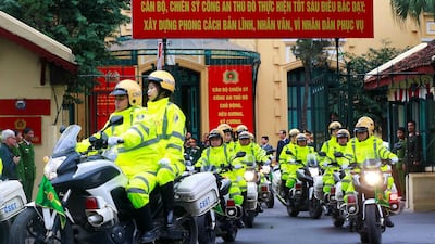 Vietnamese police leave their headquarters to patrol ahead of the upcoming North Korea-US summit. Reuters