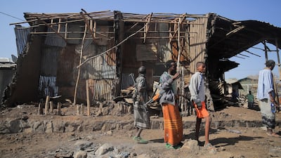 Houses destroyed by an airstrike during fighting in Tigray in February 2022. The war created famine-like conditions for hundreds of thousands. Reuters