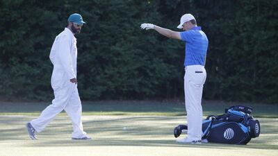 Jordan Spieth of the US takes a drop after he hit his tee shot into Rae’s Creek on the twelfth hole during the final round of the 2016 Masters Tournament at the Augusta National Golf Club in Augusta, Georgia, USA, 10 April 2016. The Masters Tournament is held 07 April through 10 April 2016. EPA/ERIK S LESSER