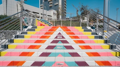 This painted staircase adds a vibrant touch to Reem Central Park. Courtesy Aldar Properties