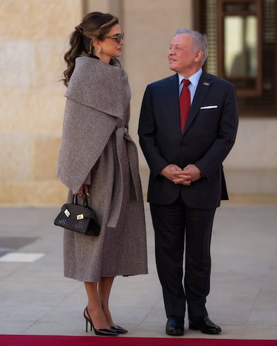 Queen Rania pairs the coat with a Ferragamo Hug bag and Aquazzura heels. Photo: Ferragamo
