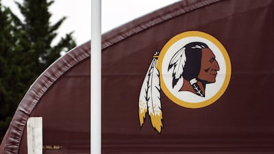 A Washington Redskins logo stands outside of FedEx Field in Landover, Maryland. Getty Images / AFP