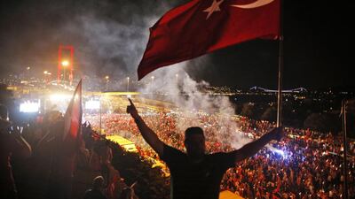 Government supporters protest against the attempted coup on July 21. Emrah Gurel / AP