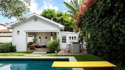 The garden has a private pool, as well as a large cabana with a bar. Courtesy Engel & Volkers