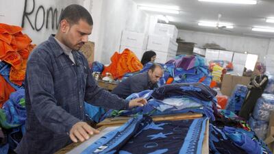 Manufacturers fear competition from low-cost exporters such as Bangladesh will destroy their industries if they have to increase workers’ salaries. Mohamed Abd El Ghany / Reuters