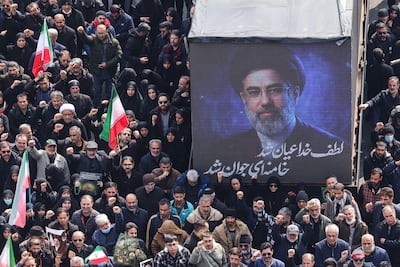 The face of Iran's new supreme leader Mojtaba Khamenei was displayed during funerals for assassinated commanders in Tehran. AFP