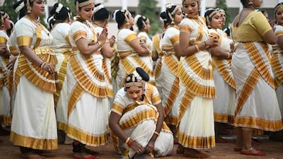 Women prepare to perform Mohiniyattam, an indigenous classical dance from Kerala, at an event in Chennai, India. AFP