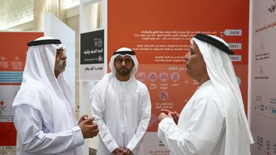 Sheikh Nahyan bin Mubarak, Minister of State for Tolerance, speaks with Matar Al Tayer, chairman of the board and executive director of RTA, right, during a Capstone project presentation.