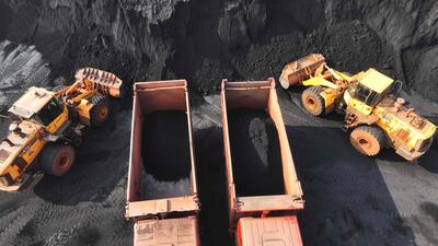 Vehicles transferring coal at the coal terminal of Lianyungang Port in China's eastern Jiangsu province. Two thirds of global coal today is used in China and India. AFP