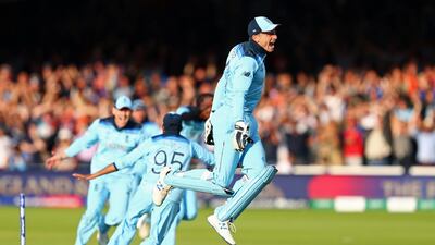 Jos Buttler of England runs out Martin Guptill of New Zealand to seal victory for England during the Final of the ICC Cricket World Cup 2019 between New Zealand and England at Lord's Cricket Ground on July 14, 2019 in London, England. Getty