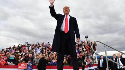 US President Donald Trump arrives for a rally at Bozeman Yellowstone International Airport in Montana. AFP