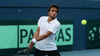 Hamad Janahi of UAE playing against Shahin Khaledan of Iran in the Davis Cup tennis tournament held at Aviation Club in Dubai. The UAE are looking to a more concerted bid for a place in the Davis Cup’s Group II next year after failing to take their chances at home this week. Pawan Singh / The National.