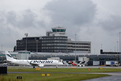 A Finnair Embraer aircraft taxis at Manchester Airport in Britain. Reuters