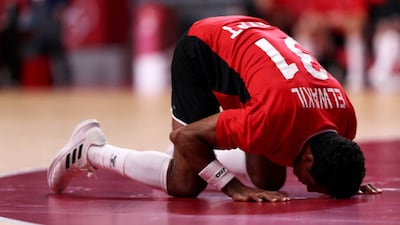 Omar Elwakil of Team Egypt prays after losing.