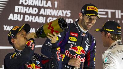 Vettel, left, finished first. Webber, center, came second. And in third was Nico Rosberg, right.