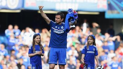 Frank Lampard says goodbye to Chelsea with his daughters Luna and Isla. Michael Regan / Getty Images