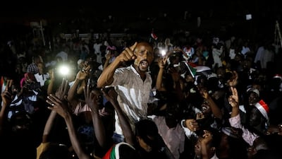 Sudanese demonstrators protest outside the Defence Ministry in Khartoum. Reuters