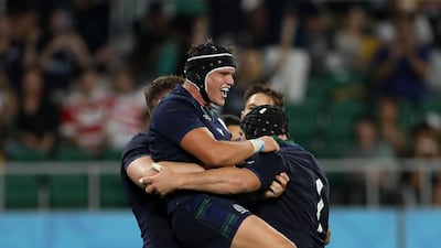 George Turner of Scotland celebrates with teammates after scoring his team's fifth try during the Rugby World Cup 2019 Group A game between Scotland and Russia at Shizuoka Stadium Ecopa in Fukuroi, Shizuoka, Japan. Getty Images