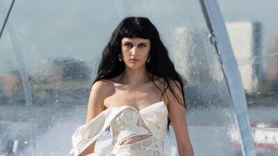 Whitework embroidery on a slashed bodice and a calico tulle skirt from spring/summer 2023. Photo: Alexander McQueen