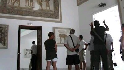 Outside the thick walls of the fine museum, Tunisia is sweating through a Ramadan marked by a tough struggle with itself to create a new national identity, after an uprising last year overthrew president Zine El Abidine Ben Ali.