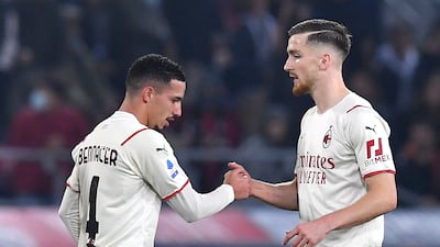 AC Milan's Ismael Bennacer celebrates scoring their third goal with Alexis Saelemaekers. Reuters