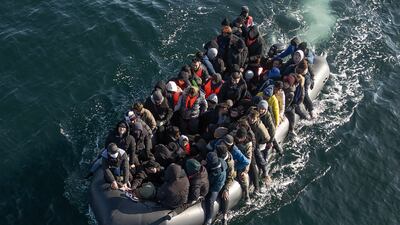People crossing the English Channel. The previous UK government is under fire over the amount spent on a Rwanda deportation scheme that never got off the ground. AP