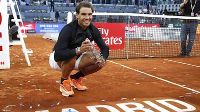Rafael Nadal celebrates his victory at the Madrid Open men's final match against Austrian Dominic Thiem at the Magic Box in Madrid, Spain, 14 May 2017. Sergio Barrenechea / EPA