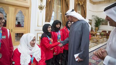 Sheikh Mohammed bin Zayed, Crown Prince of Abu Dhabi and Deputy Supreme Commander of the Armed Forces, with members of the UAE Paralympic Games team at the Sea Palace. Mohamed Al Hammadi / Crown Prince Court - Abu Dhabi