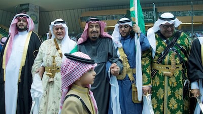 King Salman of Saudi Arabia performs the traditional Ardah sword dance as part of the activities of the Janadriyah cultural festival in Riyadh on February 20, 2018. Bandar Algaloud / Courtesy of Saudi Royal Court / Reuters