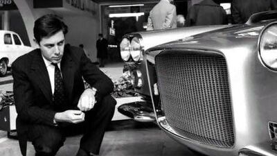 Sergio Pininfarina in 1959, gazing at one of his Ferrari creations. AP Photo