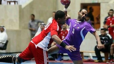 Al Ain’s handball team, in purple, lost their first match in three games as they went down to Al Jazira at the Khalifa Stadium.