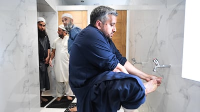 Members of the Muslim community attend the opening of the first mosque built on the Western Isles, Stornoway, Scotland, on May 11, 2018. Jeff J Mitchell / Getty Images