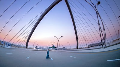 Sheikh Mohammed bin Rashid walks on Infinity Bridge.