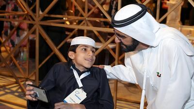 Ghanim Al Muftah takes a photo with Sheikh Mohammed bin Rashid at the Arab Social Media Influencers Awards in Dubai. Wam