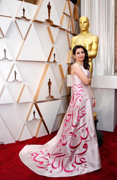 Waad Al Kateab poses on the red carpet during the Oscars arrivals at the 92nd Academy Awards in Hollywood, Los Angeles, California on February 9, 2020. Reuters
