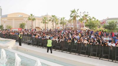 Hundreds of fans line up hoping to get a glimpse of Shah Rukh Khan. Courtesy Bollywood Parks Dubai