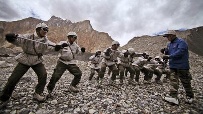 Indian army soldiers train at the Siachen base camp in Kashmir on the border with Pakistan on July 19, 2011. AP Photo