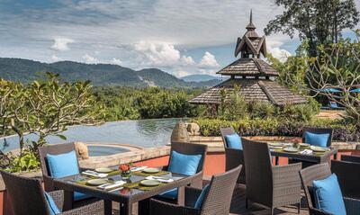 The resort sits atop a ridge overlooking the Mekong River. Anantara