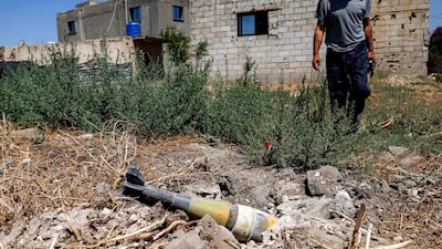 An unexploded artillery shell left behind in Syria after Israeli bombardment in June. AFP