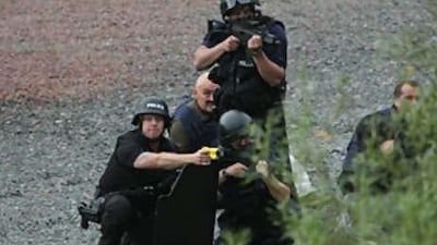 Police negotiate with Raoul Moat on July 9 in Rothbury, England.