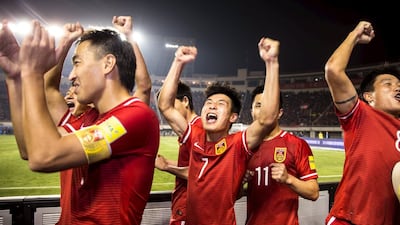 Football Soccer - China v Qatar - World Cup 2018 Qualifier - Shaanxi Province Stadium, Xi'an, China - 29/3/16. Wu Lei of China celebrates with teammates after winning against Qatar. REUTERS/Stringer ATTENTION EDITORS - THIS PICTURE WAS PROVIDED BY A THIRD PARTY. THIS PICTURE IS DISTRIBUTED EXACTLY AS RECEIVED BY REUTERS, AS A SERVICE TO CLIENTS. CHINA OUT. NO COMMERCIAL OR EDITORIAL SALES IN CHINA.