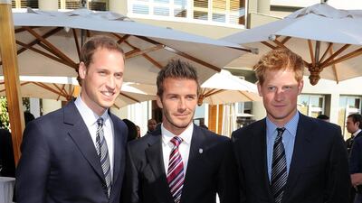 Prince William, David Beckham, in classic suiting and a striped tie, and Prince Harry attend an FA reception at the Saxon Hotel on June 19, 2010 in Johannesberg, South Africa. Getty Images